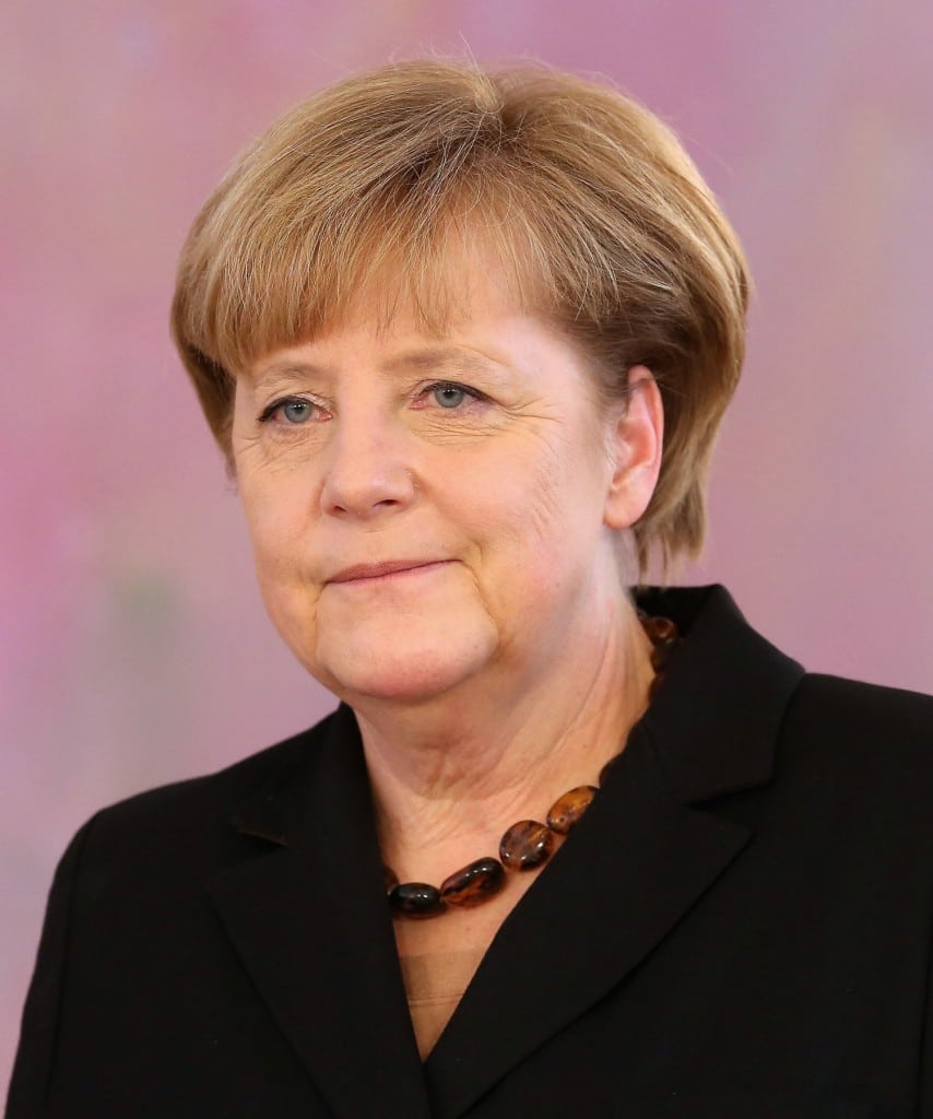 German Chancellor Angela Merkel attends a ceremony in which German President Joachim Gauck appointed the new German government cabinet on Tuesday in Berlin, Germany.
