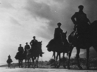 caporalato: uomini a cavallo durante l'occupare le Terre di Corleone.